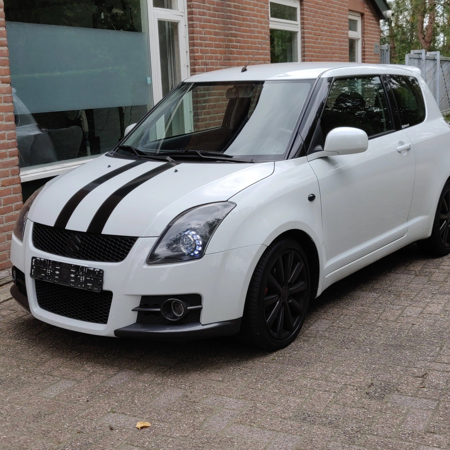 Swift with customs headlights full picture